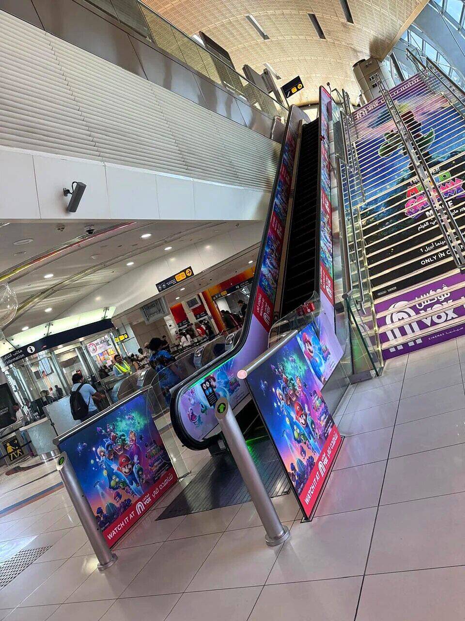 VOX Cinemas escalator and staircase branding