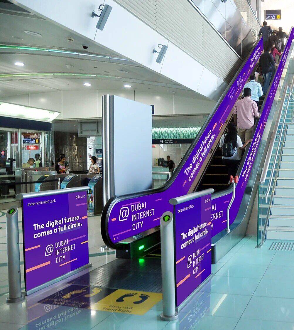 Dubai Internet City escalator branding